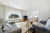 Wohnzimmer 1.OG - Attraktives Mehrfamilienhaus mit 3 Wohneinheiten & 2 Garagen in Langenhagen! Mein Haus = Mein Makler