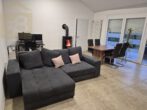 Wohnzimmer - Neuwertige 2-Zimmer Doppelhaushälfte mit großer Terrasse & Kaminofen! Meine Immobilie – mein Partner