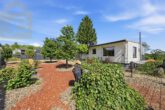 Hausansicht - Modernisiertes Zweifamilienhaus mit großem Garten, Sauna und Garagen! Meine Immobilie=Mein Partner!