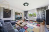 Wohnzimmer - Modernisiertes Zweifamilienhaus mit großem Garten, Sauna und Garagen! Meine Immobilie=Mein Partner!