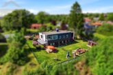 Hausansicht - Modernisiertes Zweifamilienhaus mit großem Garten, Sauna und Garagen! Meine Immobilie=Mein Partner!