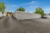 Garage (1) - 4-Zimmer-Wohnung mit neuwertiger Küche, Garage & Balkon in Wolfsburg! Meine Wohnung = Mein Partner!