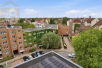 Vorderansicht mit Tiefgaragenzufahrt